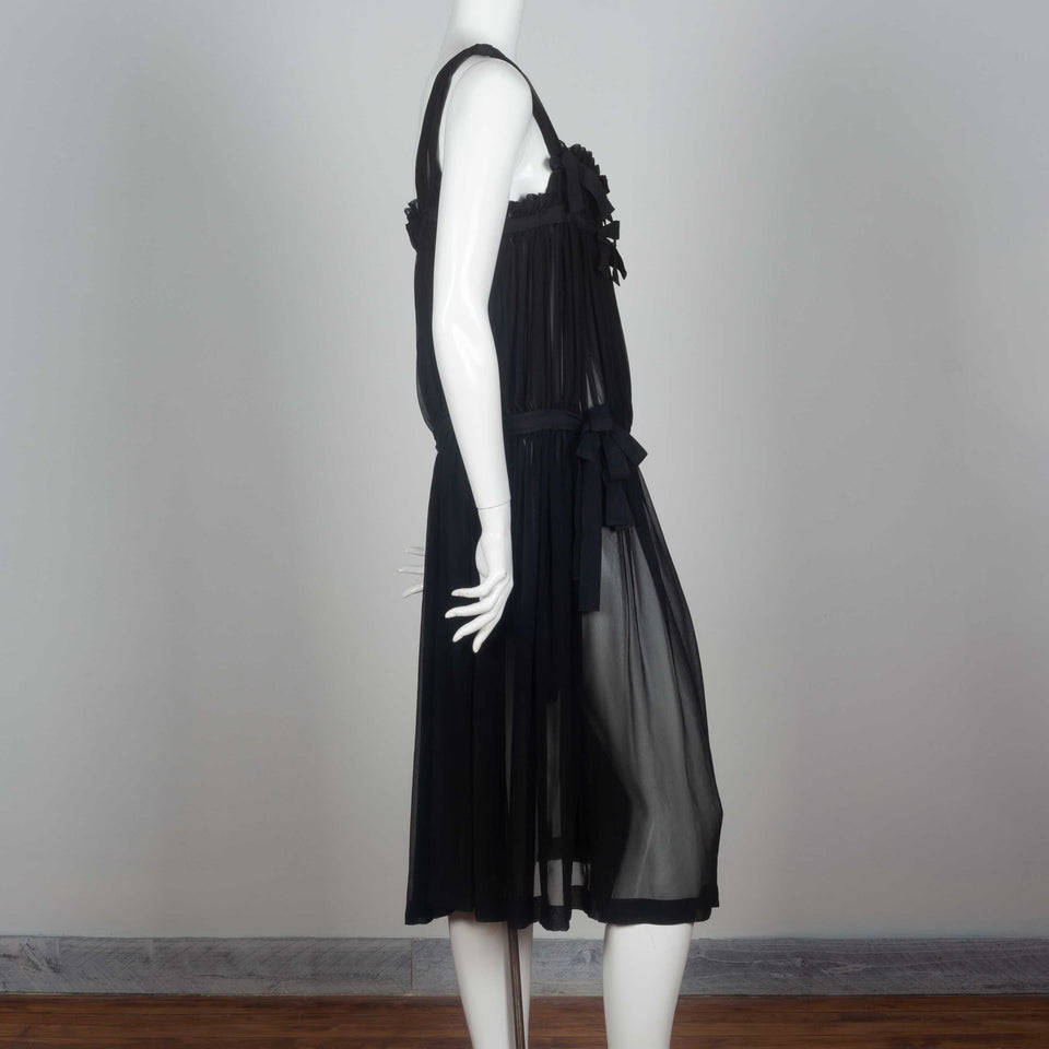 An oversized black chiffon dress from Japan by Comme des Garçons Tricot, vintage archive 2011.