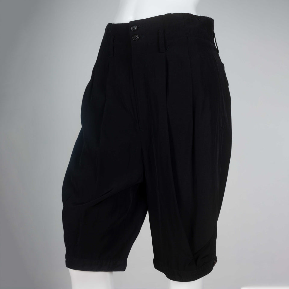 Comme des Garçons 1998 black, knee-length silk shorts from Japan.