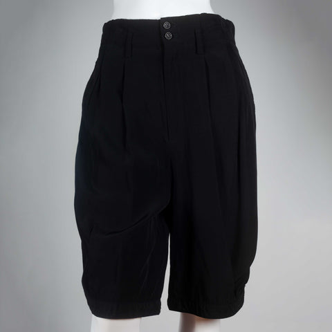 Comme des Garçons 1998 black, knee-length silk shorts from Japan. 