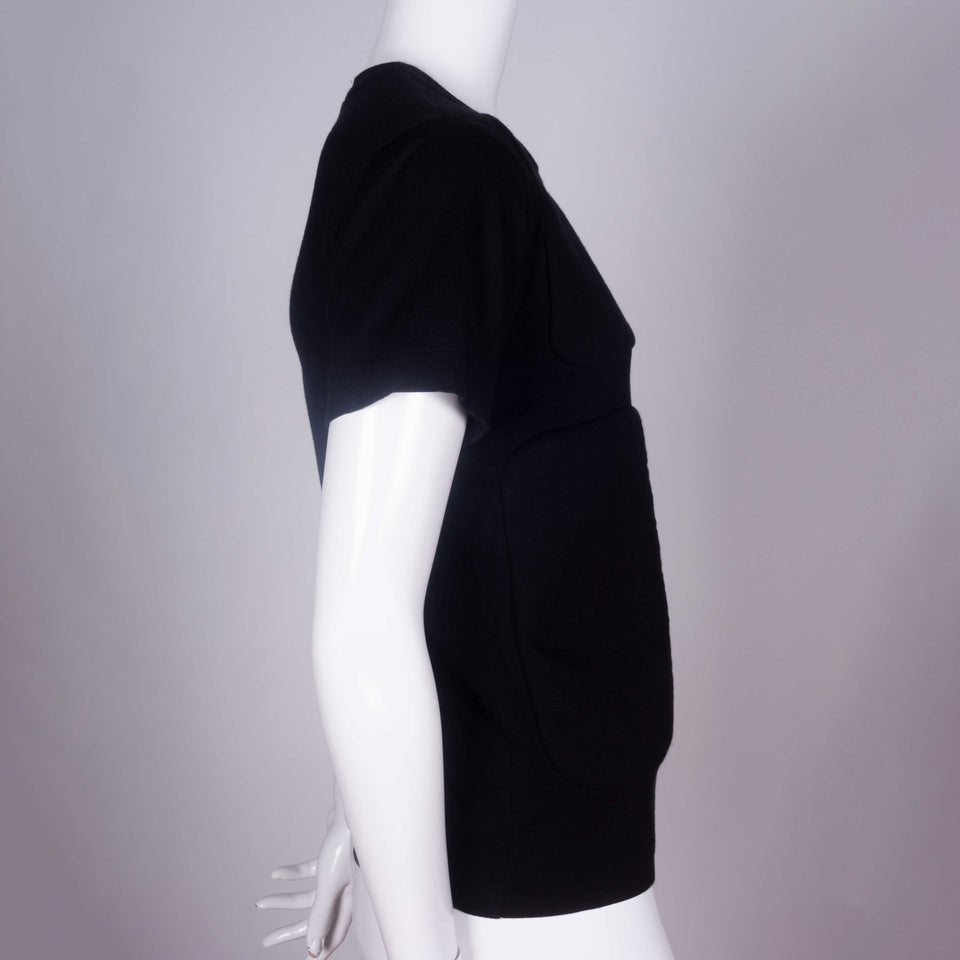 Comme des Garçons 2016 black crew neck tee from Japan with four sections of padding on the front chest and torso.