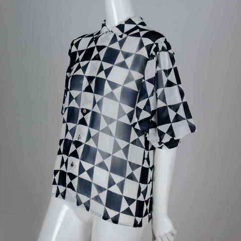 Comme des Garçons 1989 chiffon blouse from Japan with black and white geometric motif, short lantern sleeves and cut away collar.