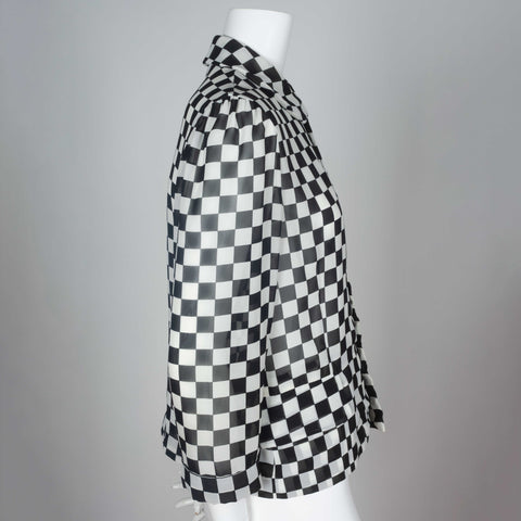 A 1996 chiffon long sleeve blouse from Japan by Comme des Garçons with black and white checkered print and peter pan collar.