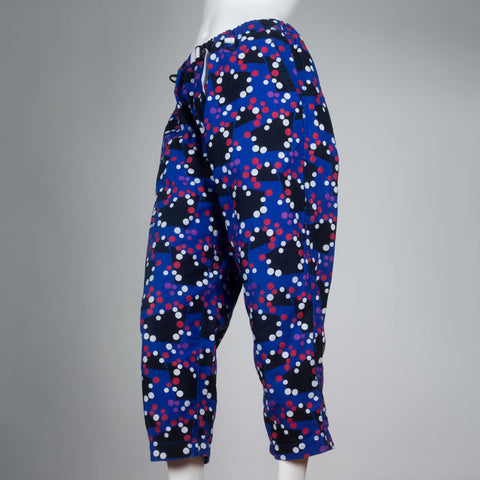 Comme des Garçons Ganryu 2012 trousers in blue with black geometric pattern, and red and white dots. 