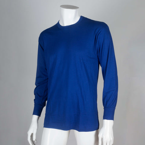 Vibrant blue cotton long-sleeve jersey tee from Japan with text "1989 Comme des Garçons HOMME" on back.