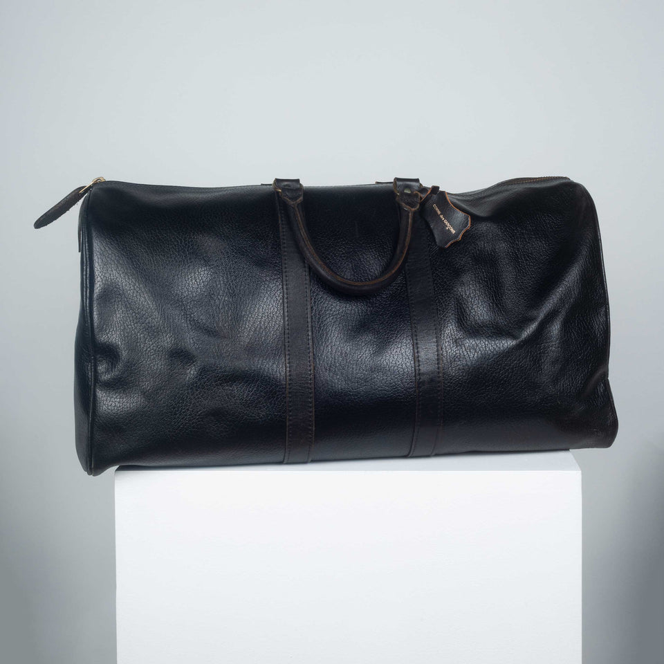 Comme des Garçons large, black leather Boston bag from Japan.