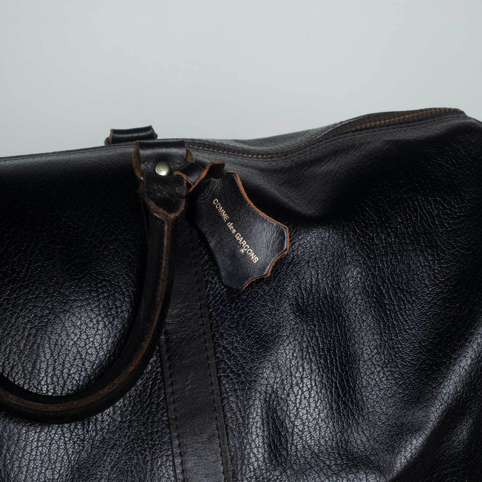 Comme des Garçons large, black leather Boston bag from Japan.