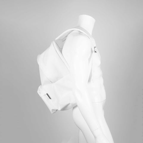 Comme des Garçons minimal backpack in white. 
