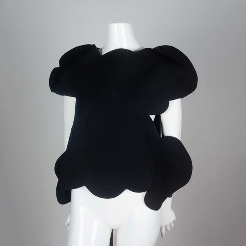Comme des Garçons 2012 black wool shirt with an organic cloud shape and open sides under arms. 