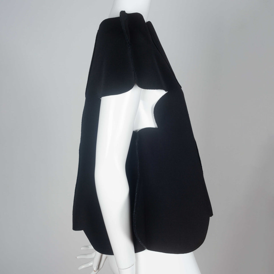 Comme des Garçons 2012 black wool shirt with an organic cloud shape and open sides under arms. 