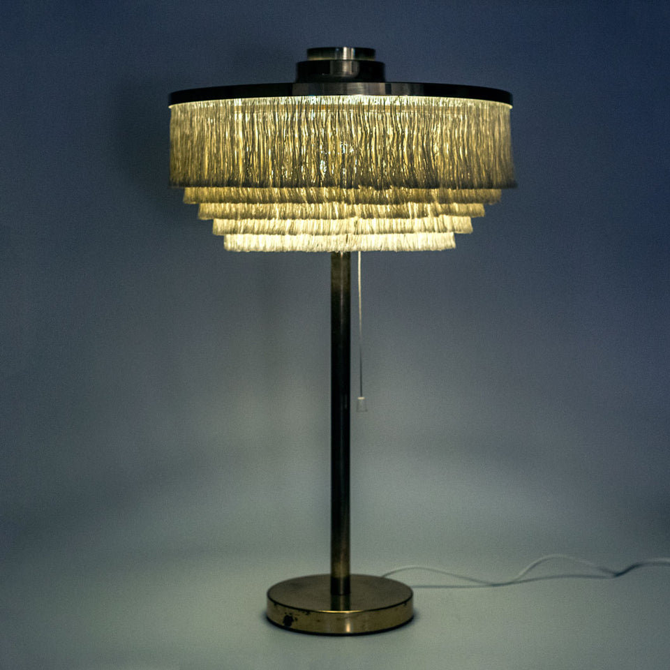 Large brass and silk fringe table lamp designed by Hans-Agne Jakobsson in 1965.