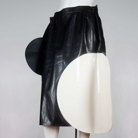 Junya Watanabe x Comme des Garçons 2014 faux leather skirt from Japan embellished with white and black circles. 