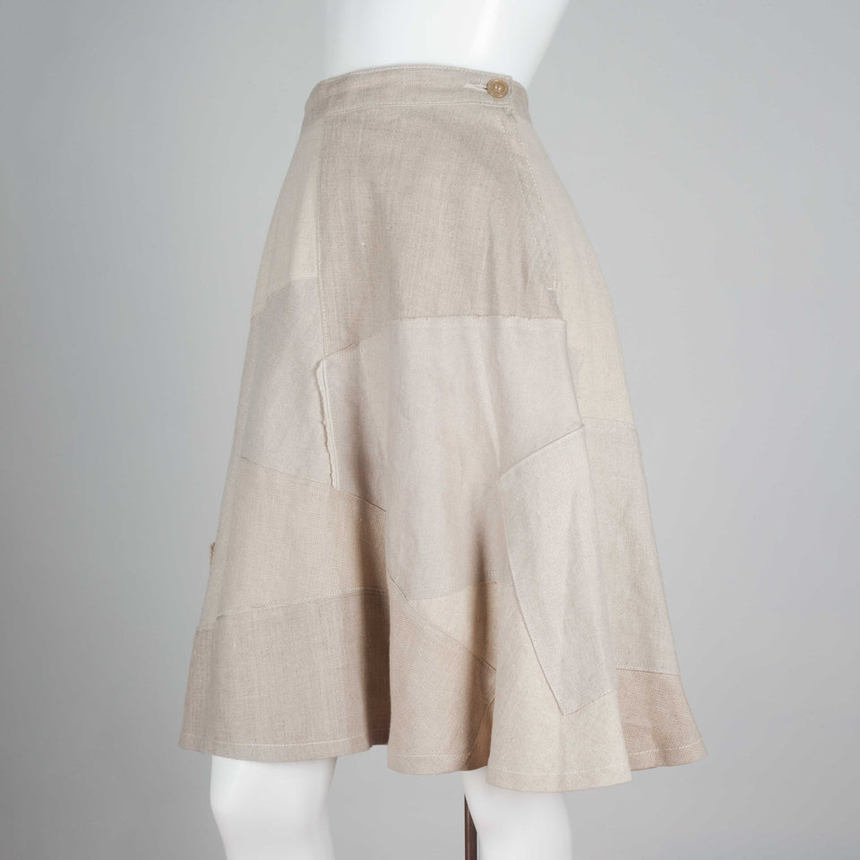 Junya Watanabe x Comme des Garçons 2013, a patchwork skirt from Japan composed of neutral tones in patchwork linen and an A-line cut. 
