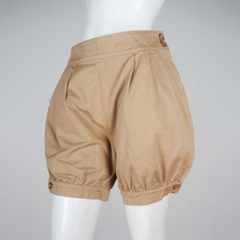 Junya Watanabe x Comme des Garçons, beige shorts from Japan with tapered, button hem and a ballooning fit to the fabric around hips and thighs. 