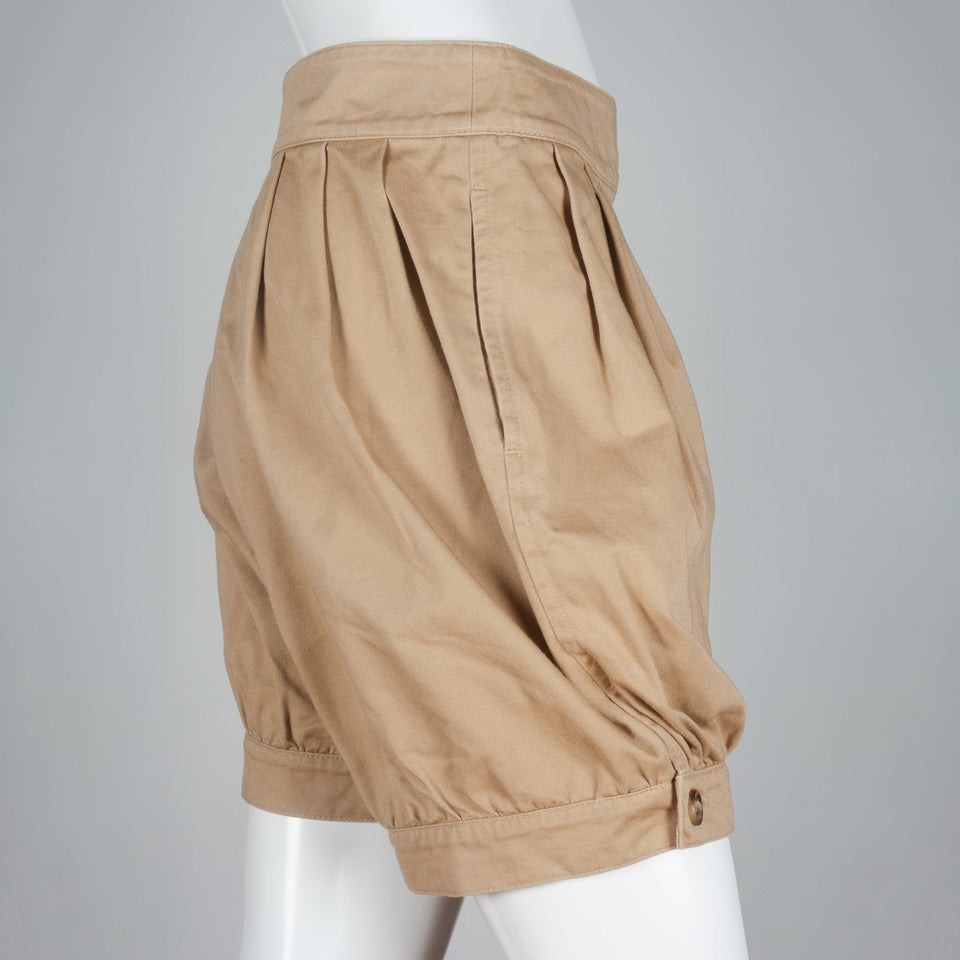 Junya Watanabe x Comme des Garçons, beige shorts from Japan with tapered, button hem and a ballooning fit to the fabric around hips and thighs. 