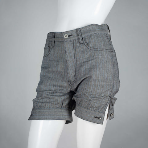 Junya Watanabe x Comme des Garçons 2007, gray wool shorts with pin stripe pattern, dark stitching and tapered, button hem. 