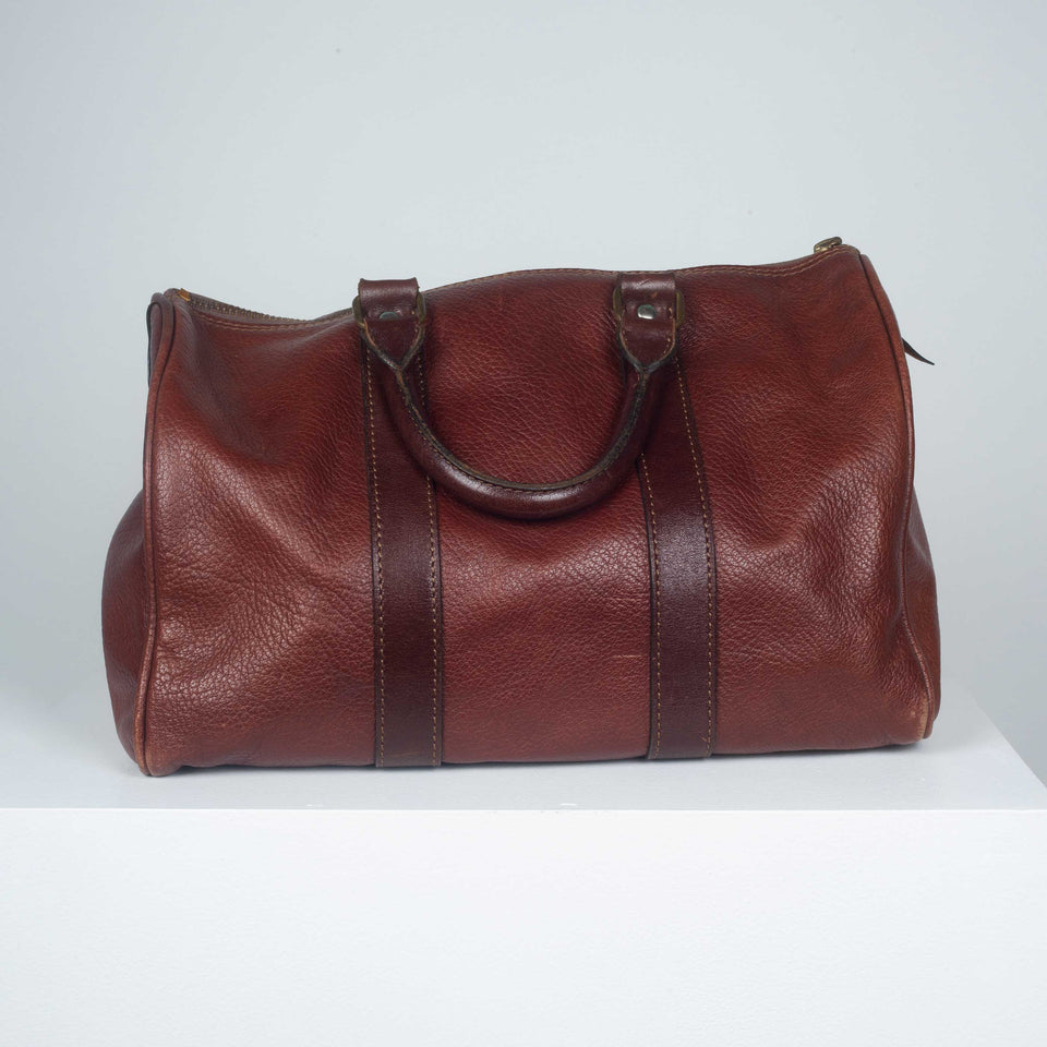 Comme des Garçons small, brown and burnt sienna leather Boston bag from Japan.