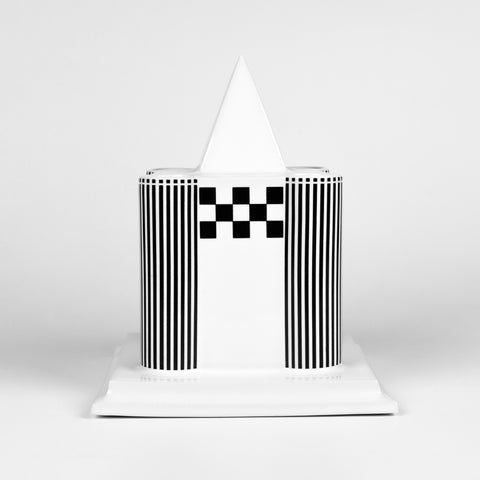 Candle holder in the shape of a Viennese castle in glazed porcelain with black and white painted graphics. 
