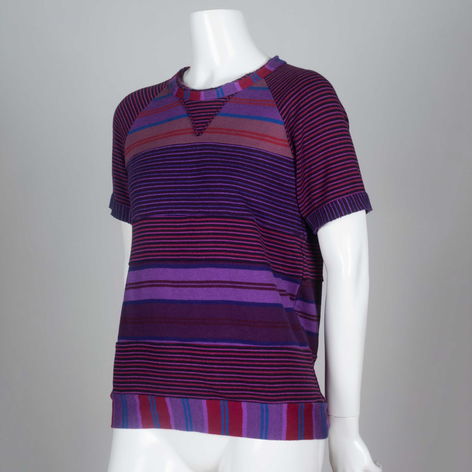 Comme des Garçons Tricot, 2003. A purple, blue and red vintage archive tee from Japan with multi-directional, horizontal stripes and raglan sleeves. 
