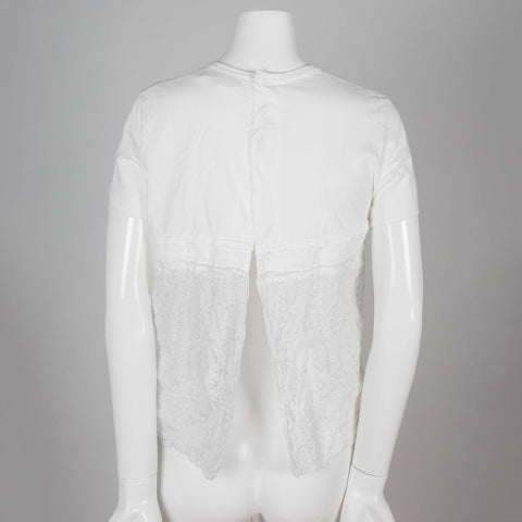 Comme des Garçons Tao, a white cotton t-shirt with embroidered linen lower that looks like lace.