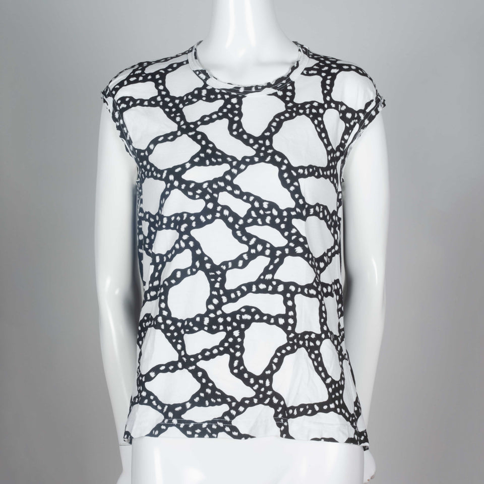 Comme des Garçons 2010 black and white sleeveless t-shirt with sinuous graphic design.