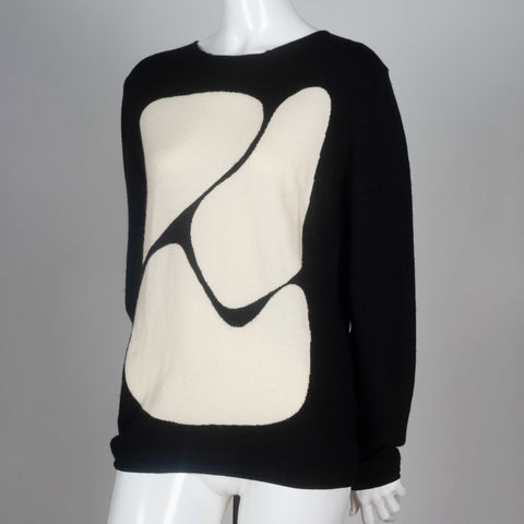 Comme des Garcons black, long sleeve wool shirt with off-white abstract shapes design. 