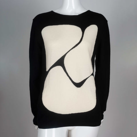 Comme des Garcons black, long sleeve wool shirt with off-white abstract shapes design. 