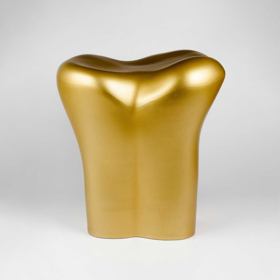 Gold tooth stool by Philippe Starck at PHX Gallery Chicago. 