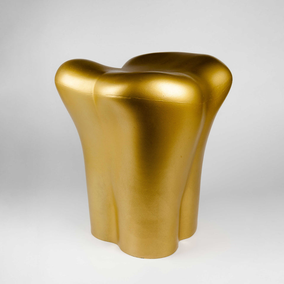 Gold tooth stool by Philippe Starck at PHX Gallery Chicago. 