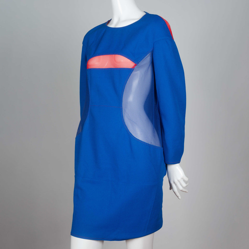 Junya Watanabe x Comme des Garçons 2012 blue three quarter sleeve, knee length dress with pink mesh covered cut-outs.