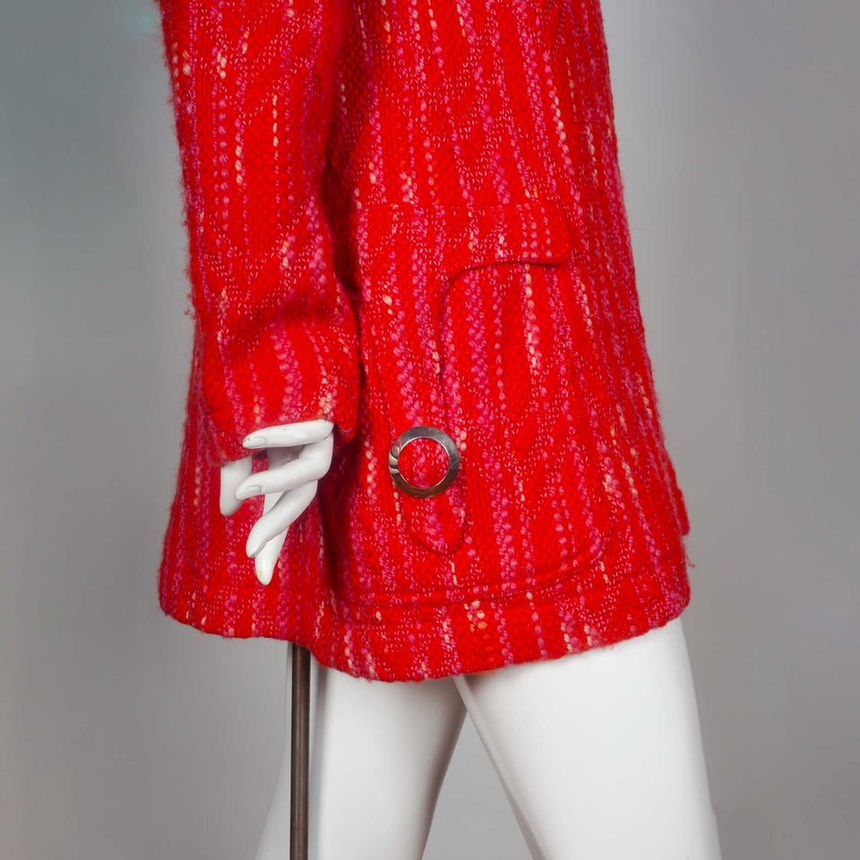 Junya Watanabe Comme des Garçons orange wool jacket with wide collar and zip front.