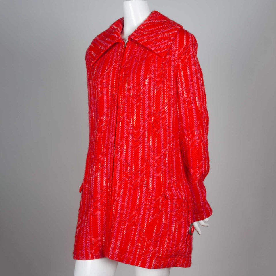 Junya Watanabe Comme des Garçons orange wool jacket with wide collar and zip front.