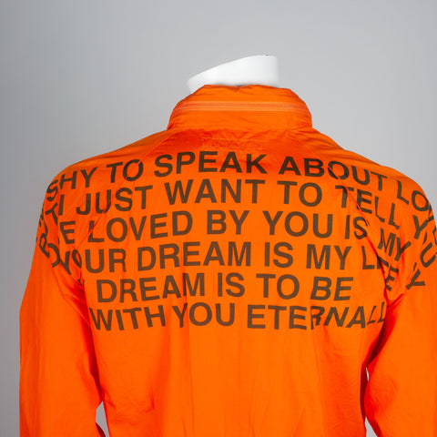 Junya Watanabe Comme des Garçons 2001 poem coat from Japan in bright orange.