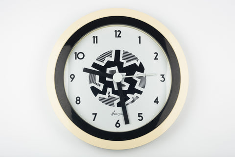 Postmodern wall clock designed by the Memphis Group founding members and couple, George Sowden and Nathalie du Pasquier. 