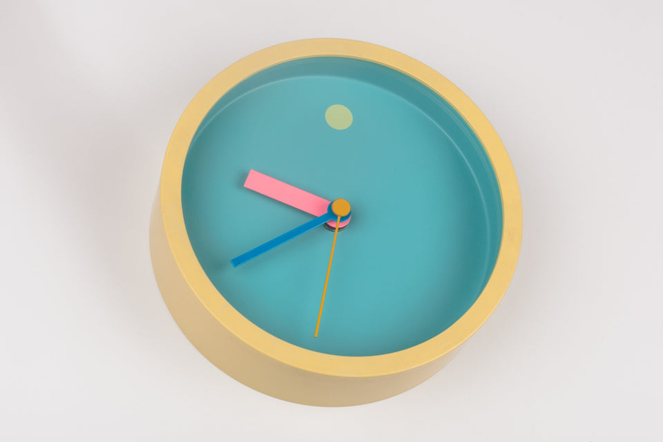 Small round wall clock by Japanese designer Shohei Mihara for Wakita. 