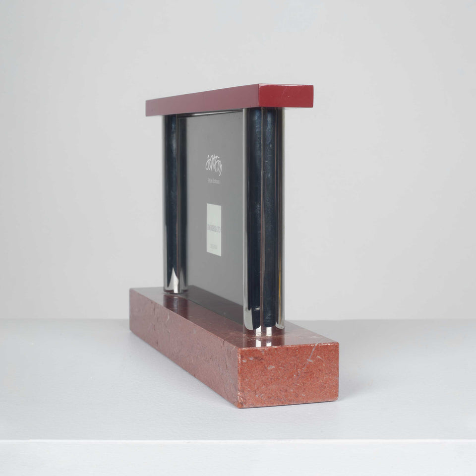 Picture frame in red marble by Italian designer, Ettore Sottsass. 