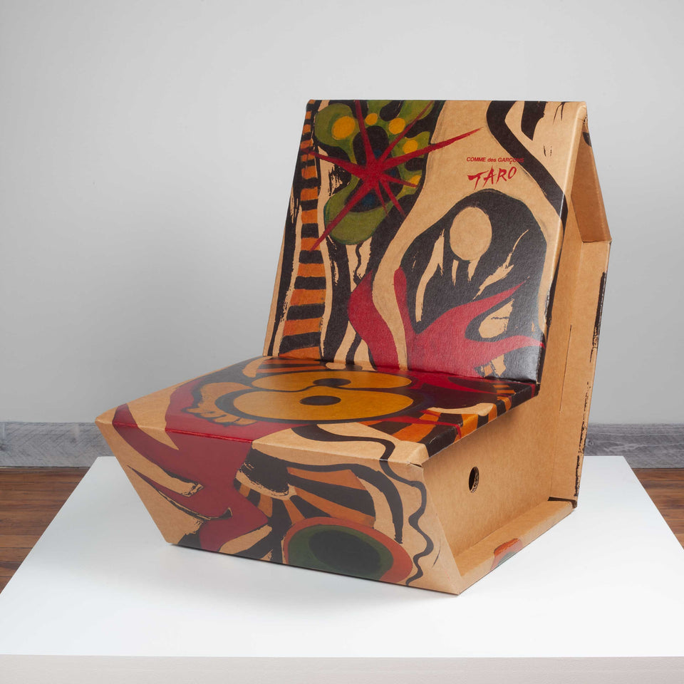 Cardboard chair with Taro Okamoto illustration, released in Japan by Comme des Garçons in 2011. 